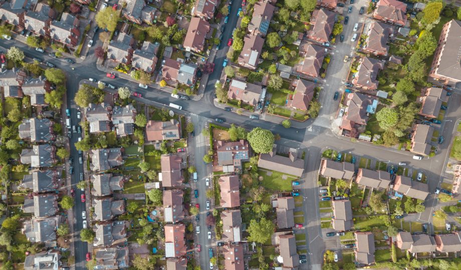 Residential houses drone above aerial view blue sky with park and greenery Residential houses drone above aerial view blue sky with park and greenery