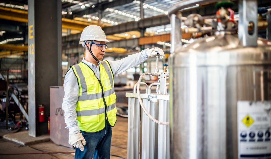 Asian worker operating a gas tank in a factory Hydrogen, UKGBC